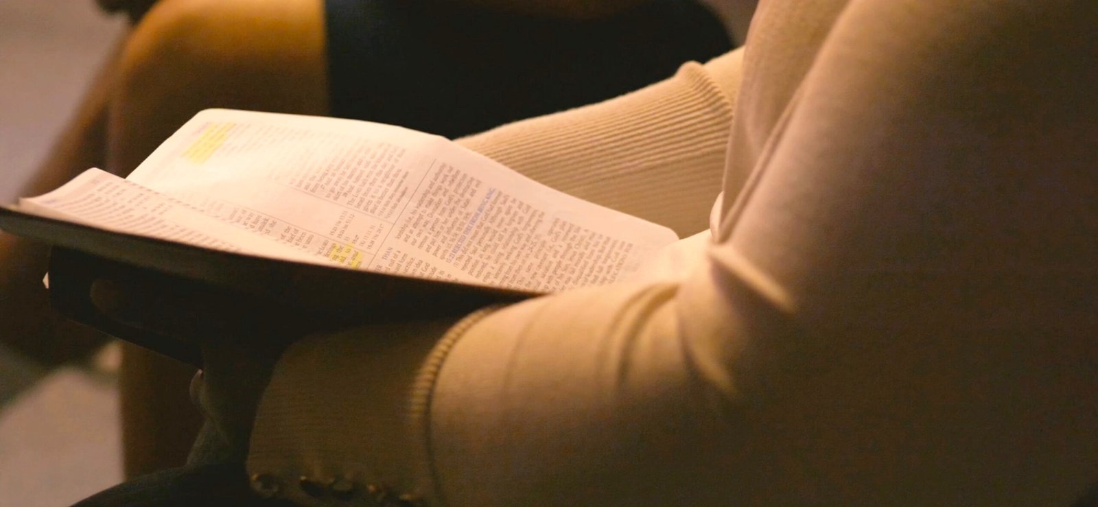 Congregant studying scripture